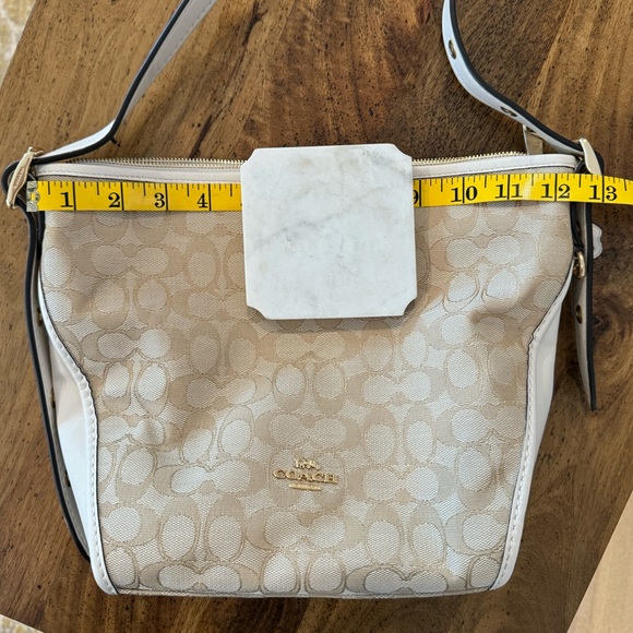 Coach Signature Duffelette Beige Canvas
Leather Trim Crossbody Bag 25697 NWOT - Picture 7 of 14